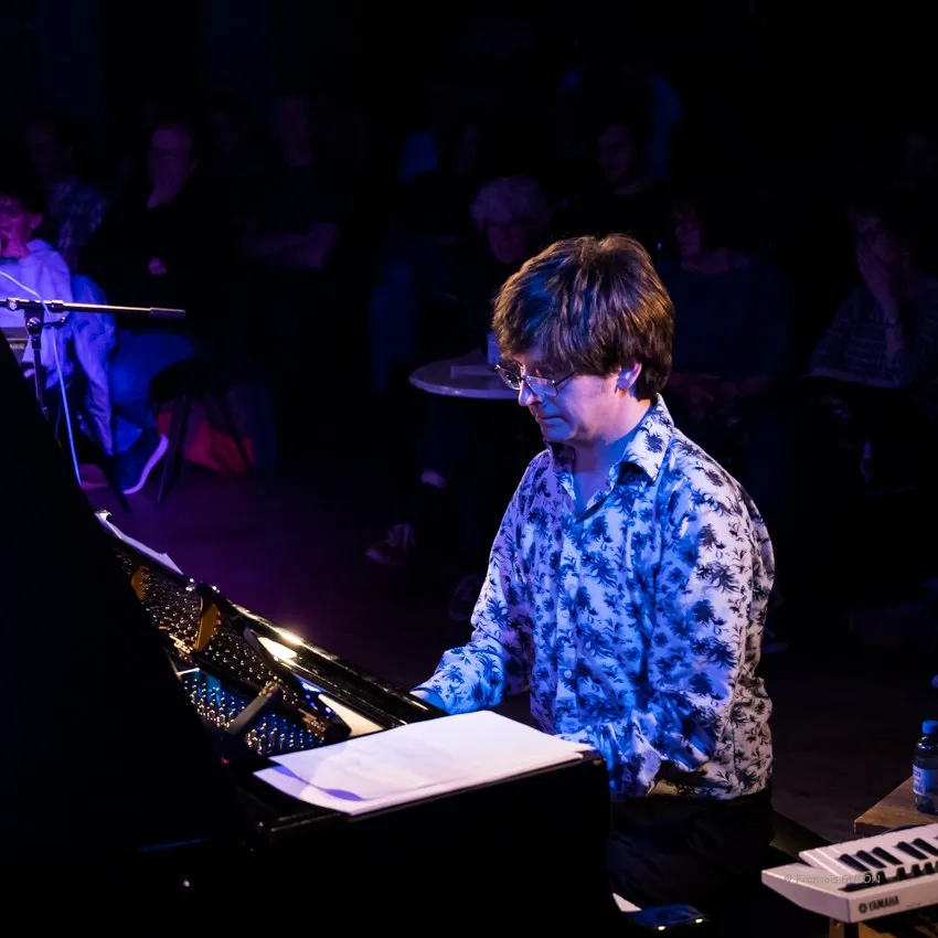 Dave O'Brien in profile at the piano